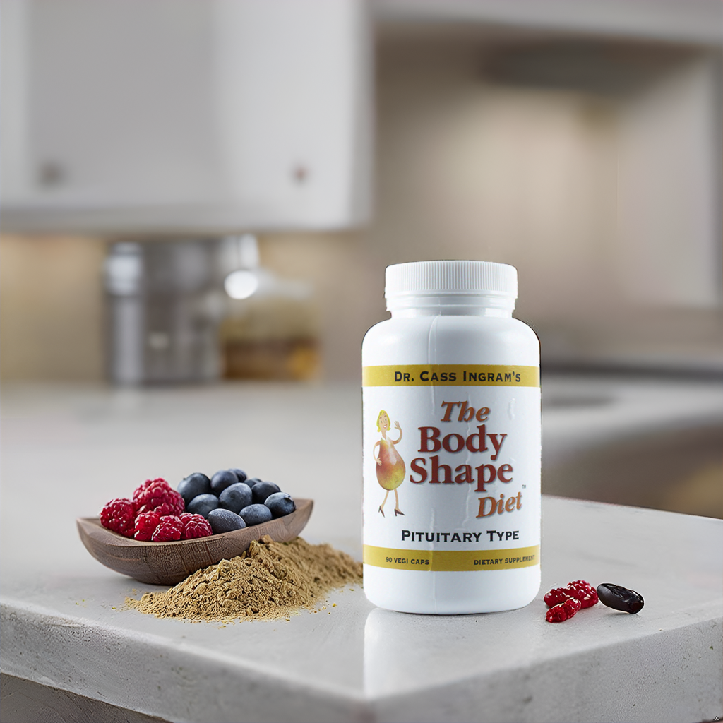 A bottle of The Body Shape Diet Pituitary Support Formula displayed in a bright kitchen with berries and powdered supplements, highlighting its blend of wild, natural ingredients and pituitary-supporting