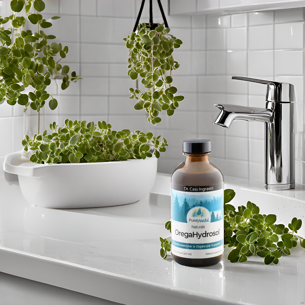 A stylish kitchen counter featuring Purely Wild OregaHydrosol Wild Oregano Juice, inspired by Dr. Cass Ingram's research, surrounded by fresh oregano, showcasing the product's natural origins.