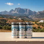 Three cans of PurelyFoods Tea with a mountainous landscape in the background